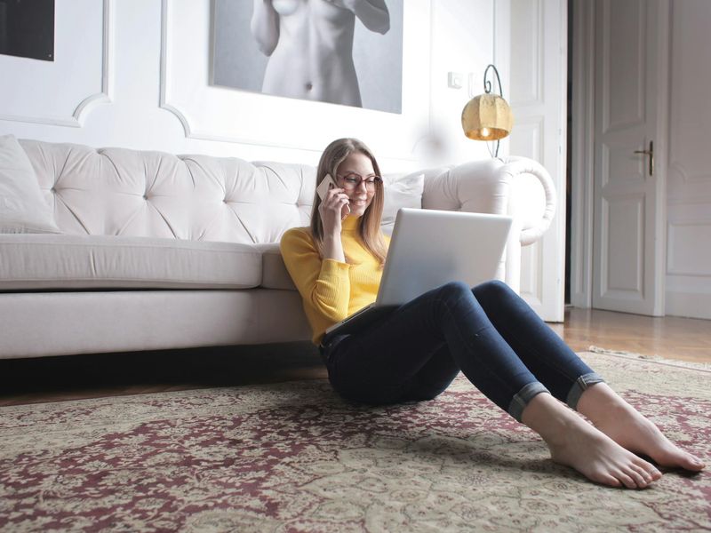 Person sitting calmly in a bright modern room
